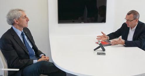 Enrique Zuazua entrevista a Alfio Quarteroni en la sede de BCAM.