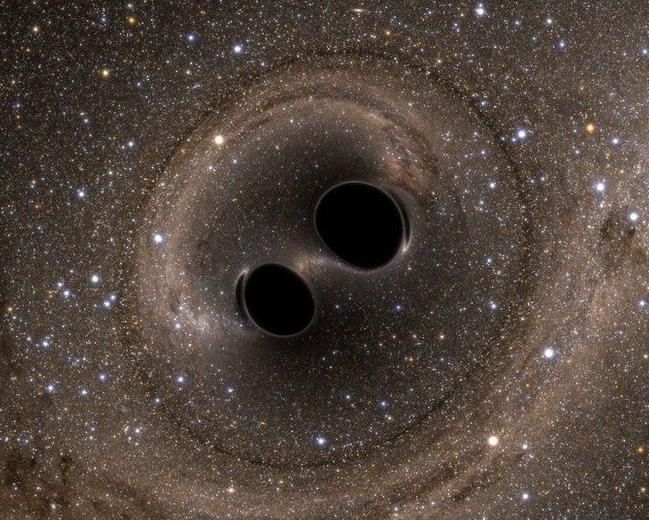 Representación gráfica de un choque de agujeros negros capaz de cerar ondas gravitacionales.